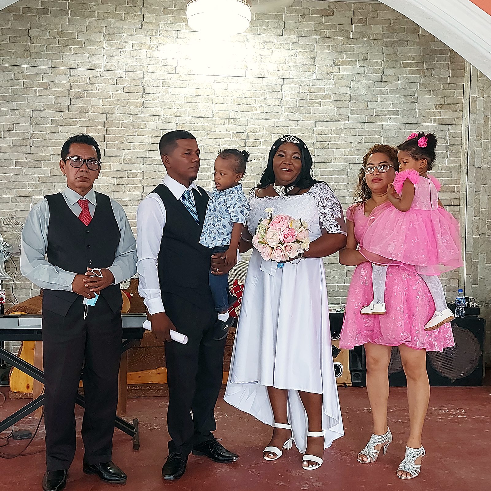 A wedding party at the front of the church